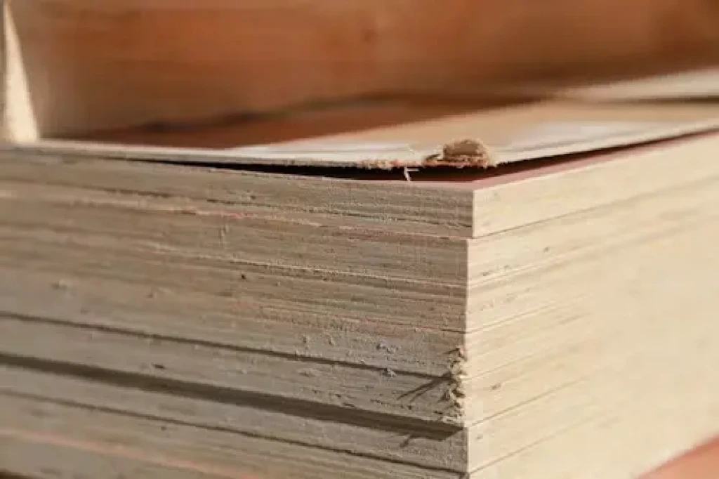 Close-up of a layered plywood edge showing veneer layers