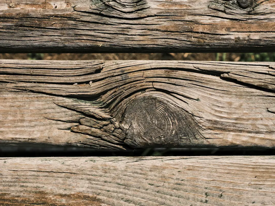 Solid timber boards with visible natural grain and knots